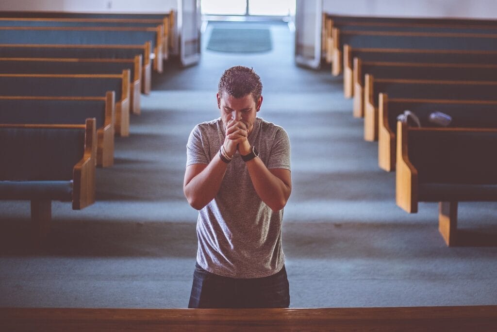 man, praying, church